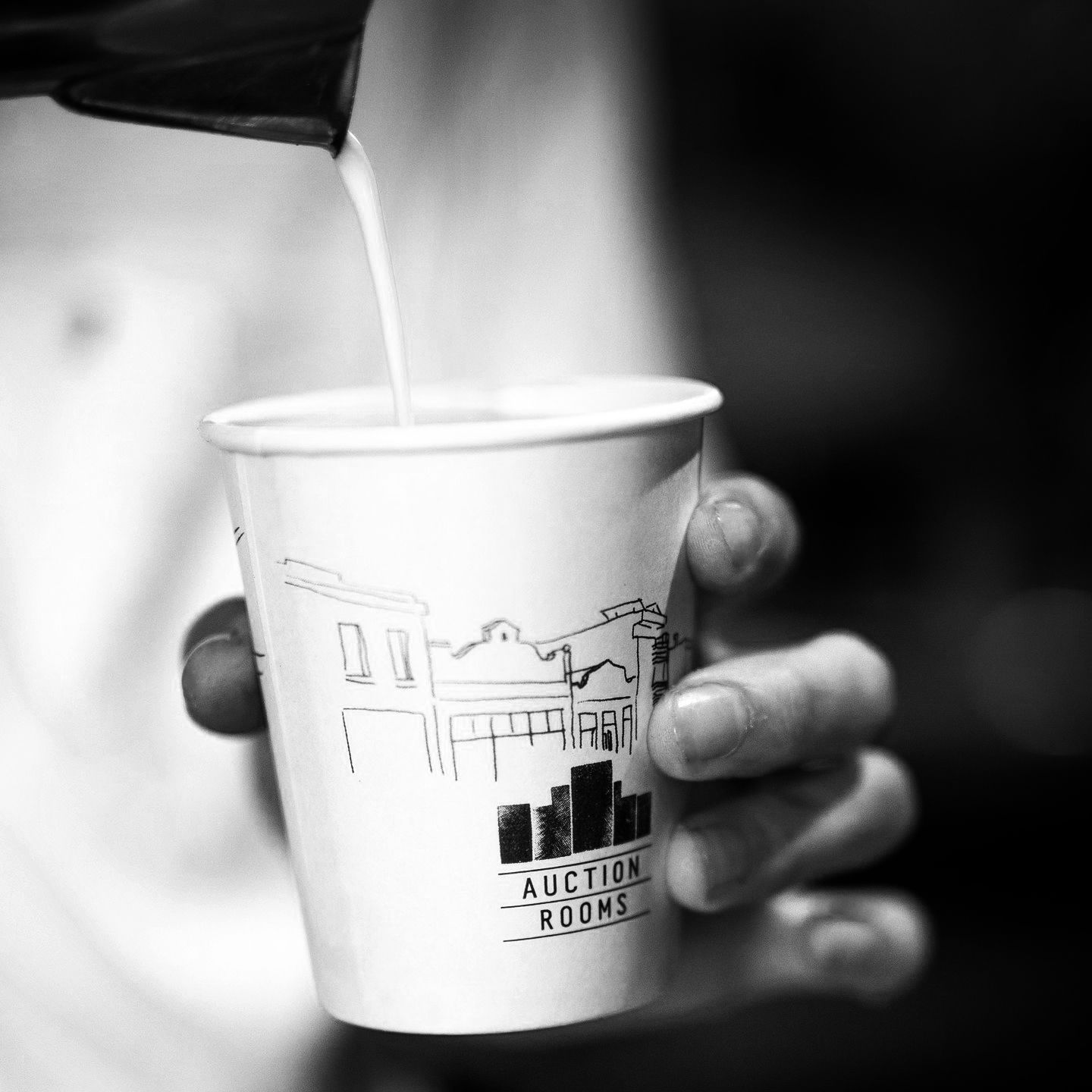 Coffee being poured into a cup